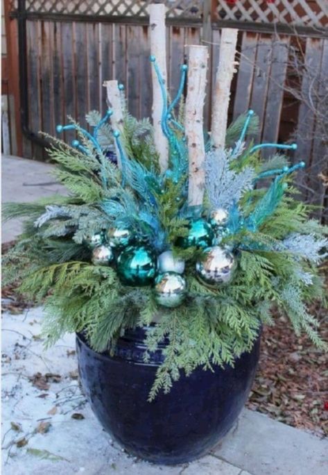 Colorful winter planters for your outdoor decorations 32 Winter Planter Ideas, Outdoor Holiday Planters, Outdoor Christmas Decorations Yard, Christmas Urns, Outdoor Christmas Planters, Gravesite Decorations, Holiday Planter, Winter Planter, Silver Christmas Decorations