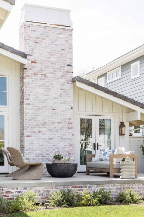 Whitewash Brick House, White Wash Brick Exterior, Mindy Gayer Design, Modern Front Porches, Coastal Exterior, Painted Brick House, White Siding, White Wash Brick, Brick Chimney