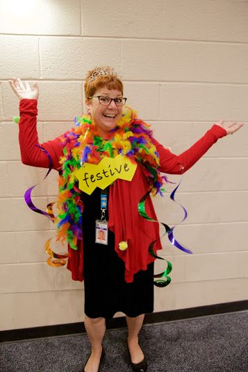 A Principal models the word FESTIVE for the Vocabulary Parade! More ideas at debrafrasier.com, click on the Miss Alaineus cover. Adjective Costume Ideas, World Book Day Dress As A Word, Word Parade Costumes, Vocabulary Day Costumes, Word Parade Costumes Vocabulary, Dress Like A Word Day At School, Word Dress Up Day, Dress As A Word Costume, Vocabulary Parade Costumes Words