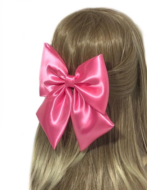 "This is more like a bubblegum pink hair bow. It is soft, light and large in size. It is a great accessory to embellish a bridesmaid's hair, to add a touch of stylishness when wearing a Sunday dress, to enhance the look of a pageant outfit, or to stand out as the birthday girl. This bubblegum pink hair bow is handmade on shiny satin fabric. For your convenience, I offer different hair clips so you can choose the one that meet your needs. You can also choose to NOT have a hair clip attached to th Pink Bow Hair, Barbie Hair Accessories, Pink Hair Bow, Barbie Hair Bow, Big Pink Bows, Elegant Pink Hair Accessories With Bow, Bubblegum Pink Hair, Cute Summer Hair Accessories With Pink Bow, Pink Hair Tie