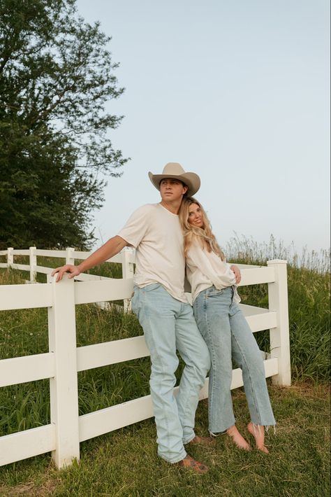 Engagement photo couple session cowboy hat engagement ring golf course wrangler jeans kissing sunset hugging photography white fence Fence, A Man, Cowboy, White