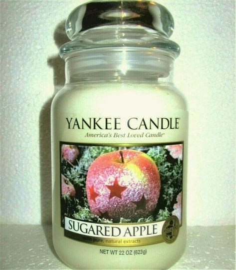 Up for sale we have:   A Brand NEW Retired Yankee Candle!  "SUGARED APPLE" NOTE.....Some places in the wax has turned just a bit translucent and is a bit darker in places due to excess oils in the wax. Wax is an ivory color. CLASSIC STYLE FRONT LABEL ~ WHITE LABEL BOTTOM!  VERY RARE & VERY HARD TO FIND!   This one is a Large 22 oz. glass jar.   Burn time is between 110-150 hours.   PLEASE JUST SEND ME A MESSAGE FOR MULTIPLE PURCHASES.... I DO OFFER COMBINED SHIPPING :-) Please be sure to browse Apple Notes, Yankee Candle Scents, Sugar Apples, Apple Candles, Fragrant Candles, Candle Store, Candy Christmas Decorations, Large Jar, Yankee Candle