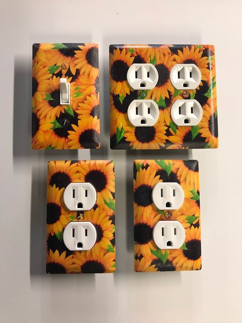 Stainless Steel switch/outlet cover set.  They boasts a hydrographic pattern of beautiful sunflowers. The screws are also decorated to match the pattern for a seamless finish. Standard 15amp, 120v outlets and 1 Switch ARE  available. Sunflower Wall Art Home Decor, Bedroom Decor Sunflower, Sunflower Light Switch Covers, Sunflower Accent Wall, Sunflower Room Ideas, Sunflower Living Room Decor, Cowgirl House, Granny Unit, Sunflower Stuff