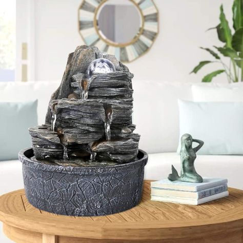 Made from sturdy poly resin, this rock waterfall fountain is lightweight and durable for lasting long. Comes with quiet submersible pump, no worry of the interruption of pump noise. Crafted to be like a realistic rockery, giving it a wonderful natural appeal.Classic and elegant, this fountain brings soothing quality to your home. Desktop Fountain, Indoor Tabletop Water Fountain, Indoor Tabletop Fountains, Table Fountain, Indoor Water Features, Tabletop Water Fountain, Rock Waterfall, Indoor Water Fountains, Indoor Waterfall