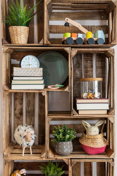 Spotted: Another truck for baby Roth. (Wondering how Jasmine, Brett and their squad put this wall together? Just keep clicking.) Wood Crate Wall, Wall Display Ideas, Crate Wall, Wall Nook, Nursery Basket, Jasmine Roth, Crate Bookshelf, Diy Crate, Vintage Crate