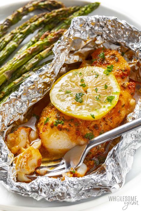 Cajun Grilled Cod In Foil (5 Ingredients!) - Wholesome Yum Cod Foil Packets Ovens, Fish In Foil Packets Ovens, Talipia Recipes Grilled In Foil, Fish Foil Packets For The Oven, Grilled Cod Recipes, Grilled Cod, Haddock Recipes, Cod Fish Recipes, Grilled Fish Recipes