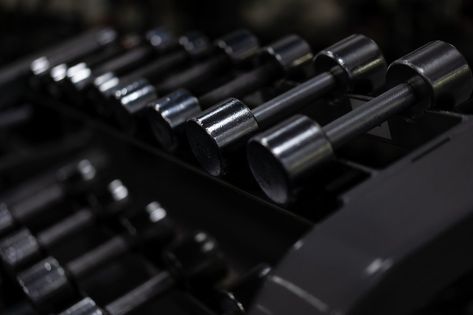 Gym. Metal dumbbells in a row Sport and fitness concept Dark toned horizontal photo Gym Photos, Sports Aesthetic, Academia Aesthetic, Black Aesthetic, Gym Women, The Row, Gym, Pins, Quick Saves