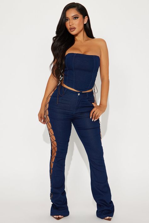 Available In Dark Wash. Pant Set Tube Top Lace Up Detail High Rise Flare Pant Stretch 33" Inseam Disclaimer: Due To The Specialized Wash, Each Garment Is Unique. Self: 56% Cotton 22% Polyester 20% Rayon 2% Spandex Imported | Dallas Lace Up Pant Set in Dark Wash size 1X by Fashion Nova Fashion Nova Outfits Baddie, Glam Closet, Female References, Without Warning, Podcast Studio, Club Fits, Bond Girls, Flare Pant, Fashion Nova Pants