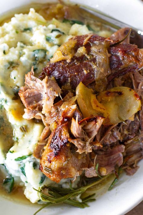 Apple Cider Braised Pork Shoulder! This delicious and comforting apple cider braised pork roast is perfect for fall. The meat is fall apart tender and so incredibly flavor-packed. It melts in your mouth. Pork Roast With Apple Chutney, Apple Braised Pork Shoulder, Apple Cider Braised Pork Shoulder Crockpot, Apple Cider Braised Pork Tenderloin, Cider Braised Pork Shoulder, Por Shoulder Recipes, Autumn Pork Roast, Best Crockpot Pork Roast, Braised Pork With Sauerkraut And Apples