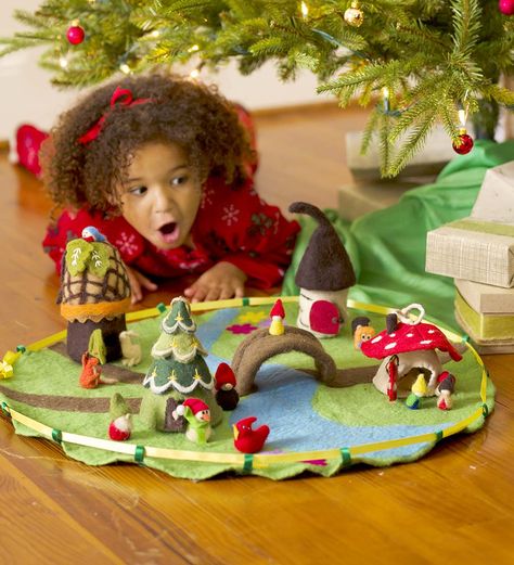 Perfect for all their favorite Mini Felt Playhouses, the Magic Valley Play Mat has a serene path that winds through the soft hillocks and up over a peaceful stream with a pop-up bridge. Great for on-the-go play—simply pull the carrying string on each side and the play mat comes together into a portable pouch. Made from 100% wool felt. #felt #christmasgifts #woodland Felt Play Mat, Felt House, Felt Owls, Felt Fairy, Felt Patterns, Felt Dolls, Felt Toys, Play Mat, Peg Dolls