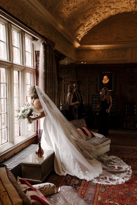 Bride looking out of window of large country ,manor house English Country House Wedding, Traditional British Wedding, English Manor Wedding, Old English Wedding, Country Estate Wedding, British Wedding Venues, Country House Wedding, Uk Countryside Wedding, Wedding Manor House