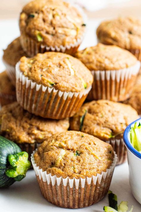 Healthy Zucchini Muffins are inspired by my whole grain healthy zucchini bread and taste amazing! Easy to make in one bowl, the results are light, fluffy, moist muffins loaded with flecks of zucchini and sweetened only with maple syrup. Healthy Zucchini Muffins, Gluten Free Zucchini Muffins, Zucchini Muffins Healthy, Banana Zucchini Muffins, Banana Zucchini, Whole Wheat Muffins, Zucchini Bread Healthy, Zucchini Muffin Recipes, Zucchini Banana Bread