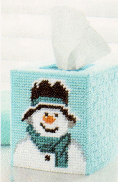 Make this snowman tissue box cover with our exclusive kit! Kit includes 7 mesh plastic canvas, acrylic yarn, and pattern. Fits boutique size tissue box. Mary Maxim Plastic Canvas Kits, Snowman Plastic Canvas, January Wreath, Tissue Box Crafts, Pocket Tissue, Snowman Quilt, Plastic Craft, Kleenex Box Cover, Plastic Canvas Coasters