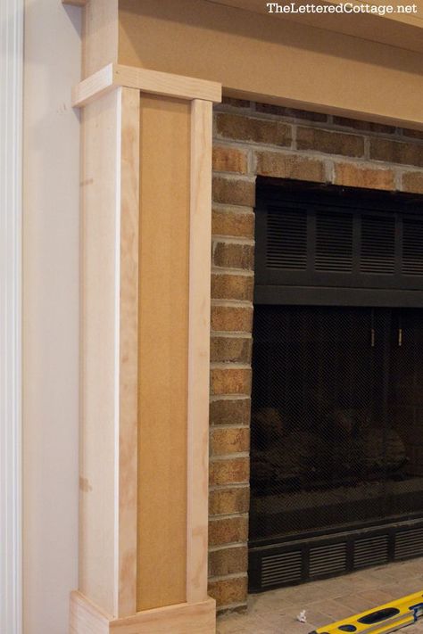 Mantle Remodel Diy, Framing Around Brick Fireplace, Red Brick Fireplaces Modern, Brick Fireplace With Antique Mantel, How To Decorate Wood Panel Walls Living Room, Modern Craftsman Mantle, Vintage Brick Fireplace, Large Brick Fireplace Makeover, Mantle Makeover Diy