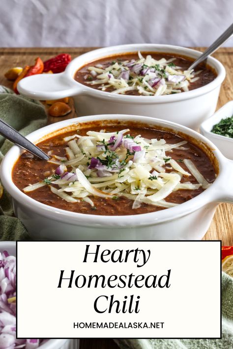 Discover the ultimate comfort food with our Hearty Homestead Chili recipe. Perfect for feeding a crowd, this large batch chili combines sausage, beans, tomatoes, and a blend of spices to create a rich, warming dish that's ideal for cold Alaskan winters. Large Batch Chili Recipe, Sausage Beans, Chili Ingredients, Homemade Cornbread, Healthy Blueberry, Ground Sausage, Homestead Living, No Bean Chili, Feeding A Crowd