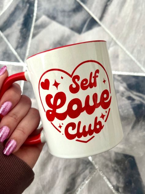 Ceramic mug with ‘Self Love Club’ quote. Made using a high quality mug with sublimation so you don’t have to worry about the quote peeling off or fading. Inside the mug is red as well as the handle. 11oz Dishwasher and microwave safe. Valentines Day Mug Gift Ideas, Mug Inspo Design, Mugs Designs Ideas, Mug Sublimation Ideas, Valentines Mugs Ideas, Cute Coffee Mugs Designs, Tazas San Valentin Ideas, Mug Design Ideas Creative, Self Love Valentines Day