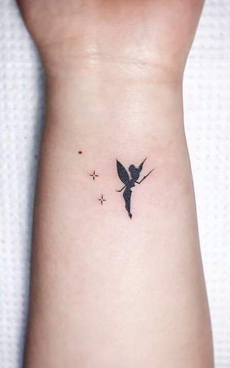 Tinkerbell Silhouette Tattoo, Small Tinkerbell Tattoo Ideas, Subtle Tinkerbell Tattoo, Tiny Tinkerbell Tattoo Ideas, Tiny Tinkerbell Tattoo, Stitch Small Tattoo, Disney Wrist Tattoo, Cute Stitch Tattoo, Silvermist Tattoo