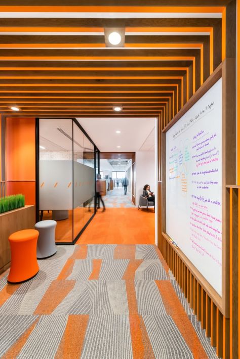 Orange Wall Office, Phone Room Design, Orange Office Interior, Office Orange Design, Fun Office Design Work Spaces, Home Office Orange, Orange Office Design, Office Interior Design Orange, Orange Interior Design Restaurant