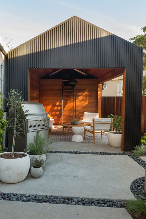 Awkwardly shaped and saddled with a run-down garage, the backyard posed a challenge. Since the city wouldn’t allow for the removal of the garage, Wendi and Lukas decided to convert it into additional living space. Diy Backyard Privacy, Modern Backyard Design, Concrete Patios, Outdoor Space Design, Simple Layout, Diy Budget, Modern Garage, Backyard Privacy, Garage Conversion