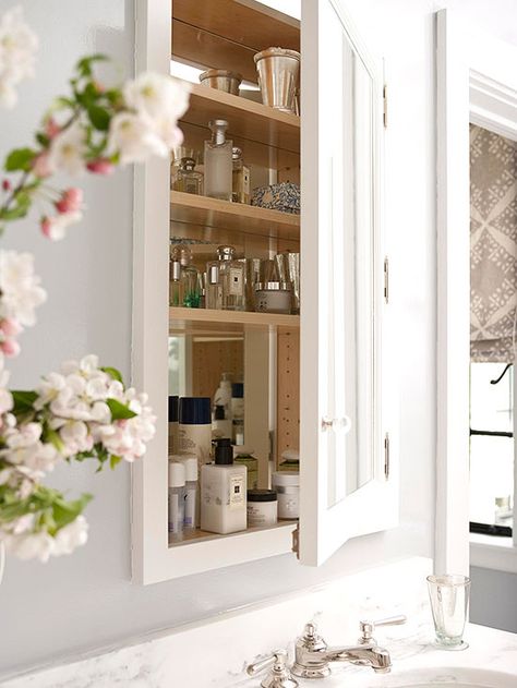 A medicine cabinet can fit neatly between wall studs above the bathroom sink, adding storage and style right where you need it. #bathroomdecor #bhg Quick Bathroom Updates, Recessed Storage, Recessed Medicine Cabinet, Guest Toilet, Bathroom Update, Trendy Bathroom, Bathroom Redo, Bathroom Renos, Bath Remodel