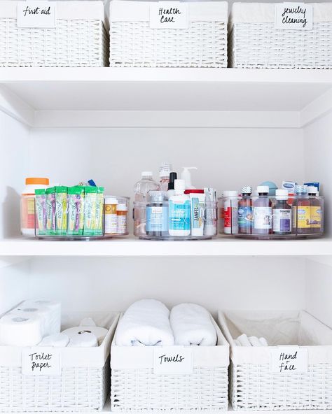 THE HOME EDIT ® on Instagram: “Linen closets are also the perfect spot for a pharmacy setup. We used baskets for sheets and towels, and divided turntables for medications…” Linens Organization, Closet Organization Baskets, Pharmacy Organization, Organized Bathroom Closet, Home Pharmacy, Office Closet Ideas, Organization Baskets, Small Linen Closets, Bathroom Linen Closet