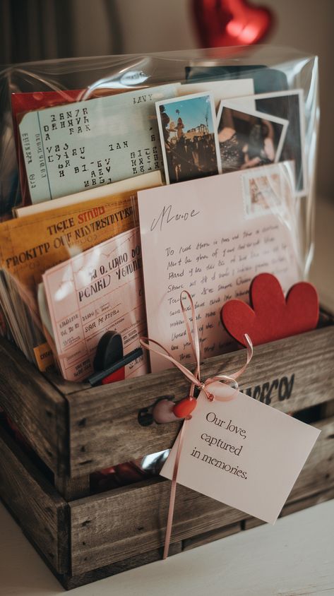 For a deeply personal and meaningful gift, create a sentimental memory basket. Start with a rustic wooden crate or a vintage-inspired box. Fill it with mementos of your relationship: ticket stubs, postcards from trips you’ve taken together, photos of your favorite moments and small trinkets that represent your journey as a couple. You can also add a love letter or handwritten poem to express your feelings. Attach a note that says, “Our love, captured in memories.” #Anniversary#birthday#Christmas Box Of Letters, Valentine's Day Gift Baskets, To Express Your Feelings, Small Trinkets, Express Your Feelings, Ticket Stubs, A Love Letter, Gift Basket Ideas, Cool Gifts For Women