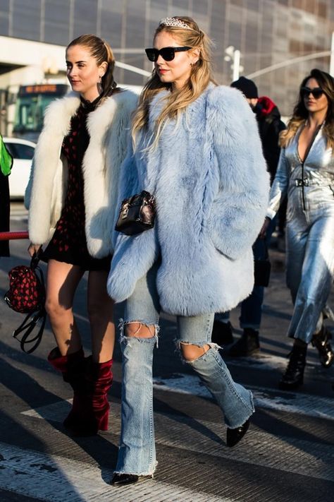 Consider teaming a light blue fur coat with baby blue ripped flare jeans to ooze class and sophistication. For the maximum chicness throw in a pair of black leather booties.   Shop this look on Lookastic: https://lookastic.com/women/looks/fur-coat-flare-jeans-ankle-boots/24100   — Silver Headband  — Light Blue Fur Coat  — Black Leather Crossbody Bag  — Light Blue Ripped Flare Jeans  — Black Leather Ankle Boots Blue Fur Coat, Street Style New York, Trendy Winter Fashion, La Fashion Week, Cooler Look, Fur Coats, Street Style Chic, Coat Outfits, Fur Fashion