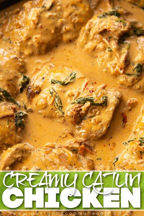 Juicy chicken thighs drenched in the most irresistible creamy cajun sauce! | www.dontgobaconmyheart.co.uk Chicken Thigh Comfort Food, Chicken Thigh Pasta, Cajun Chicken Thighs, Creamy Cajun Sauce, Juicy Chicken Thighs, Cheap Meal Prep, Creamy Cajun Chicken, Dirty Rice Recipe, Cozy Food