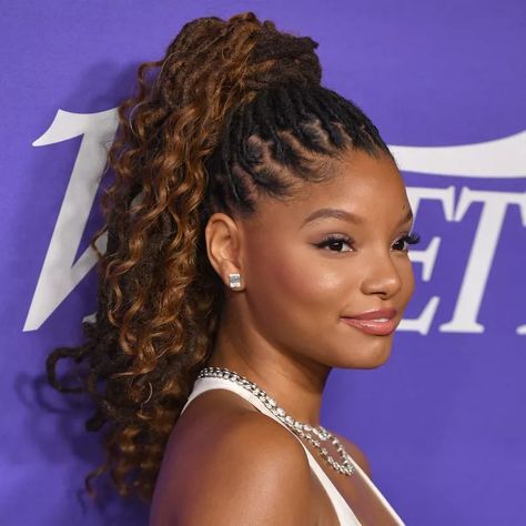 15 of Halle Bailey's Best Hair Looks Bun Braid Hairstyles, Halle Bailey Hair, Loc Ponytails, Locs Cornrows, Straight Back Braids, Bun Braid, Keeping Hair Healthy, Dreadlocks Hairstyles, A High Ponytail