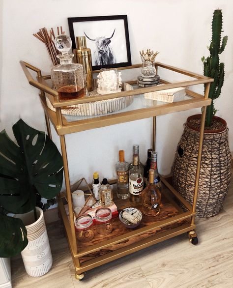 Boho bar cart Bar Cart Organic Modern, Boho Bar Setup, Round Bar Cart Decor, Bar Cart Rustic, Bar Cart In Kitchen Ideas, Mexican Bar Cart, Corner Bar Cart Ideas, Bourbon Bar Cart Styling, Western Bar Cart Ideas