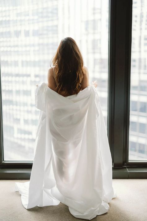 A bride wraps herself in the hotel sheets from the luxurious Langham hotel in Chicago for a boudoir photoshoot. Photoshoot Mood Board, Langham Hotel, Seductive Pose, Fairy Tale Wedding Dress, Luxurious Hotel, White Sheets, Instagram Photo Inspiration, Shoot Inspiration, Photography Women