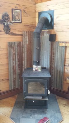 Corrugated tin heat shield | Wood Stove | Pinterest | Corrugated ... Wood Stove Heat Shield, Corner Wood Stove, Wood Stove Surround, Stove Surround, Wood Stove Ideas, Stove Wall, Stove Hearth, Wood Stove Wall, Wood Stove Hearth