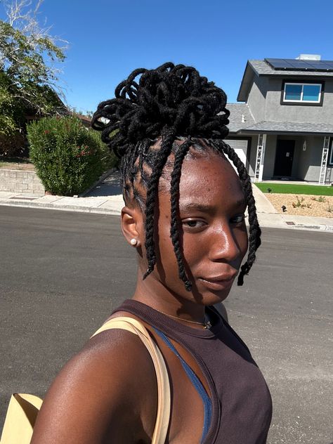 loc petals on locs Loc Elegant Styles, Loc Hairstyles For Prom, Short Loc Ponytail Styles, Half Up Half Down Petal Bun Locs, Pigtail Loc Styles, Petal Bun Loc Styles, Loc Styles Petals, Loc Flower Bun, Dreadlock Updo Hairstyles