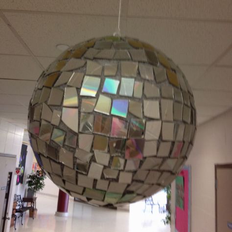 I had to pin this one:) which says "Homemade disco ball made from a styrofoam ball and old CDs for our school carnival!!!" Now I want to make one.:) Kindergarten Prom, Dance Decor, Dance Decorations, School Carnival, Old Cds, Prom Decor, Vbs Ideas, Class Decor, Fall Fest