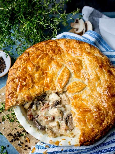 My chicken and mushroom pie is proper comfort food. Encased in buttery puff pastry, and made extra special with a sprinkling of bacon, it's a family mealtime favourite. #chickenpie #pieweek #comfortfood #winterfood #whoateallthepies #mushrooms #puffpastry #familydinner #nationalpieweek #britishpieweek Chicken Pot Pie With Mushrooms, Chicken And Mushroom Pie Recipe, Pastry Chicken Recipes, Turkey Pie Recipes, Chicken Pie Recipes, Chicken And Mushroom Pie, Chicken Pie Recipe, Bacon Mushroom, Savoury Pies