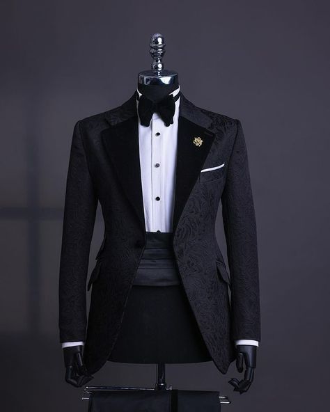 A charcoal black, floral notch lapel tuxedo suit, tux pant trosuer & bow tie

What you get :

suit
pant trousers
Tie

Other items on request:

Signature Accessories
Shirt

Price - available on website

To Order:

iMessage, Text or WhatsApp : +2348179435662
Email: info@dejiandkola.com
Website: www.dejiandkola.com Tuxedo For Men Black Classy, Velvet Suits Men, Tuxedo For Men Wedding Classy, Black Tuxedo For Men, Classic Suits For Men, Black Tuxedo Wedding, Imessage Text, Designer Tuxedo, Modern Tuxedo