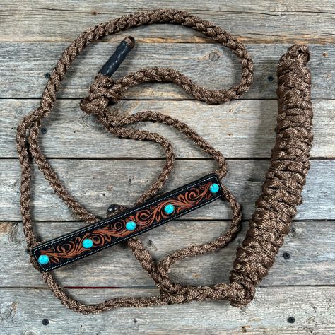 Our favorite mule tape halter with buckstitch leather noseband, is decorated with round turquoise colored cabochons conchos. Mule tape has a 10ft lead. All leads are removable Hot Headstalls Horse Tack, Paracord Color Combinations, Tack Room Ideas Barn, Mule Tape Halter, Leather Horse Halter, Bling Horse Tack, Leather Horse Tack, Horses Stuff, Horse Tack Diy