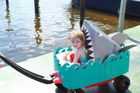 Red Wagon Parade and Fairfield Market on the Green Wagon Floats Parade, Baby Parade Float Ideas, Kiddie Parade Ideas, Wagon Parade Float Ideas Kids, Kiddie Parade Float Ideas, Nemo Wagon Costume, Mermaid Wagon Float, Kids Wagon Float Ideas, Halloween Boat Parade