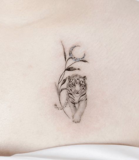 Small Big Cat Tattoo, Tiger Neck Tattoo For Women, Simple Tiger Tattoo For Women, Minimal Tiger Tattoo For Women, Tattoos Of Tigers, Japanese Tiger Tattoo Women, Wild Cat Tattoo For Women, Small White Tiger Tattoo, Tiger Wrist Tattoo For Women