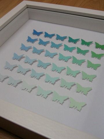 cool art piece made from paint swatches And a paper punch. So easy and cute. Paint Sample Art, Paint Samples Crafts, Chip Wall, Paint Swatch Art, Paint Chip Cards, Paint Chip Crafts, Butterfly Shadow, Paint Chip Art, Chip Art