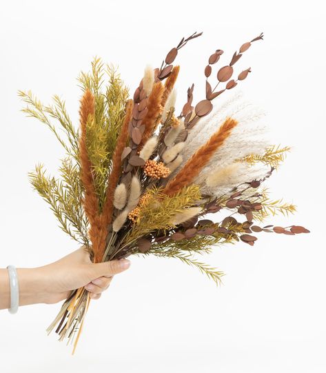 PRICES MAY VARY. Unique Bouquet--Our natural dried flowers bouquet mixed with 7 varieties of dried plants and grasses in different shapes, sizes, textures, and colors. The dried pampas grass and bunny tails grass are particularly great for floral enthusiasts to setting up your own arrangement space at home. we’ll note that the dried bunches and stems do not disappoint. Whether your style leans subdued, colorful, or a bit boho, there truly are options for everyone. Unique bouquet: Insert dried fl Pampas Bouquet Decor, Autumn Leaves Bouquet, Dried Sunflower Bouquet, Fall Mountain Wedding Decor, Dried Flower Centerpiece Wedding, Boho Table Centerpieces, Western Wedding Decor, Grass Arrangements, Boho Western Wedding