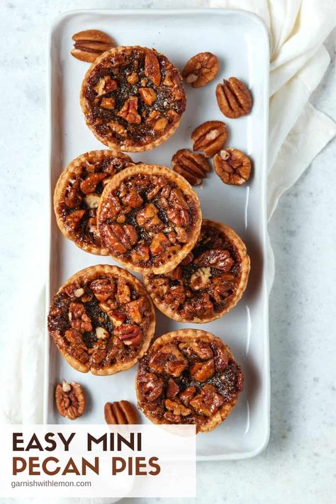 Looking for an EASY holiday dessert? Grab your muffin tin and make these delicious Mini Pecan Pies! These one bowl, make-ahead mini pies freeze beautifully and are ready to go in less than 45 minutes. Fall Desserts To Make, Mini Pecan Pie Recipes, Fall Treats Recipes, Holiday Party Desserts, Pecan Pie Muffins, Mini Pecan Pies, Pecan Pies, Individual Pies, Pecan Tarts