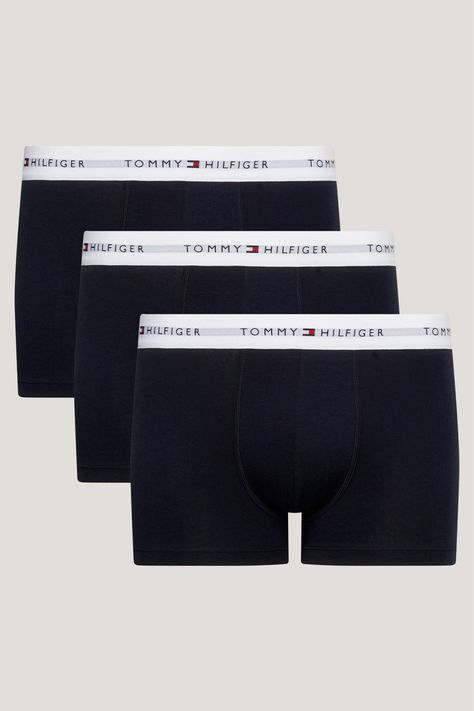 Tommy Hilfiger repeat logo on elasticated waistband—trunk silhouette, with a medium rise and medium leg for regular comfort. Stretch cotton, made with transitional cotton where farmers are transitioning to organic farming over three years. 3 pack trunks. 95% Cotton, 5% Elastane. Tomy Hilfiger, Male Gifts, Tommy Hilfiger Boxers, Men Boxers, Cotton Logo, Tommy Hilfiger Man, Padded Jacket, Heather Black, Light Jacket