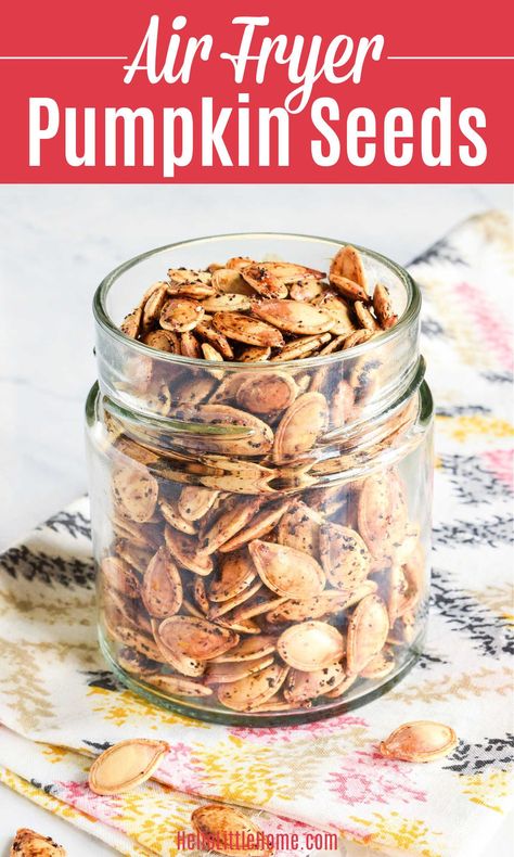 Looking for Fall Snack Ideas? You’ll love these delicious Air Fryer Pumpkin Seeds! Learn how to make the BEST Roasted Pumpkin Seeds in the Air Fryer using simple ingredients: raw pumpkin seeds, olive oil, salt, seasonings (like cinnamon sugar, garlic, other spices). This homemade Air Fried Pumpkin Seeds recipe is a tasty treat that’s crispy, crunchy, and easy to make. These healthy Air Fry Pumpkin Seeds are a great Vegetarian, Vegan, Dairy Free + Gluten Free snack recipe! | Hello Little Home Pumpkin Seed Air Fryer Recipe, Air Fried Pumpkin Seeds Recipe, How To Roast Pumpkin Seeds In Air Fryer, Homemade Roasted Pumpkin Seeds, Pumpkin Seeds Air Fryer Recipe, Pumpkin Seeds In The Air Fryer, Home Made Pumpkin Seeds, Pumpkins Seeds Recipes, Air Fry Pumpkin Seeds Recipe