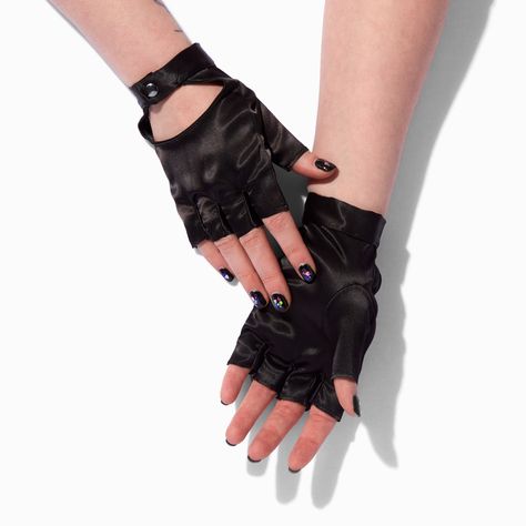 Fingerless gloves add an edgy vibe to any outfit, dressy or casual! These feature a shiny satin-like texture and a snap closure. Pack Size: 1 Pair One size Closure: Snap Material: Polyester - Claire's Black Satin Fingerless Gloves Leather Fingerless Gloves Aesthetic, Y2k Fingerless Gloves, Black Fingerless Gloves Aesthetic, Alt Gloves, Edgy Gloves, Cyberpunk Gloves, Black Gloves Aesthetic, Fingerless Gloves Aesthetic, Black Gloves Fingerless