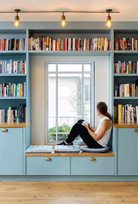 Built In Storage Wall Around Window, Bookshelf Near Window, Multiple Purpose Room, Bookshelf Bench Under Window, Elevated Reading Nook, Bay Window Bookshelf, Bookshelf Wall Around Window, Den Room Design, Guest Bedroom Library