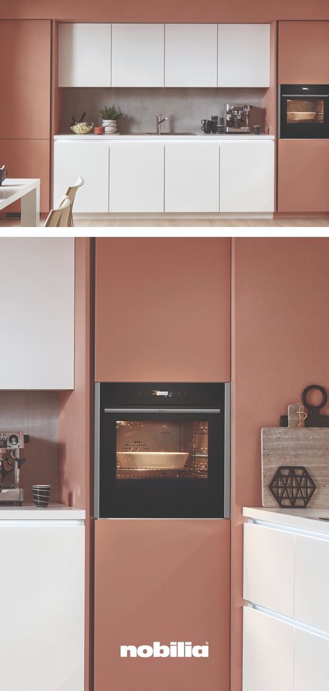 The choice of electrical appliances plays a decisive role in the modern kitchen. That's why nobilia works closely with NEFF on the design and offers users top-of-the-range built-in appliances. Particularly noteworthy is the NEFF oven in this Senso design, which is integrated seamlessly and ergonomically in a tall unit in coral. One special highlight is the Slide & Hide® oven door, which can be completely lowered. Neff Oven, Nobilia Kitchen, Tall Unit, Fully Integrated Dishwasher, Kitchen Fridges, Two Tone Kitchen, Induction Cooking, Extractor Fans, Integrated Fridge