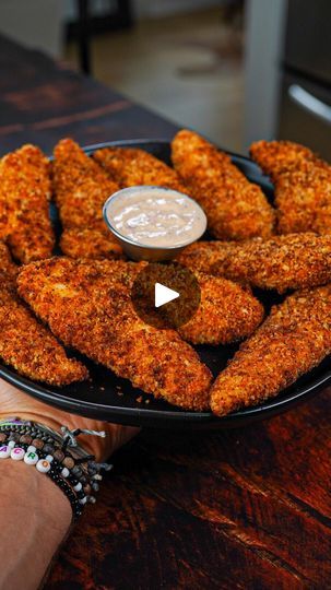 525K views · 41K reactions | 🔥 75 Cal Crispy Chicken Tender w/ Low Cal Garlic Parmesan Sauce

📍 Everything about this recipe from the crispy chicken tenders to the low cal garlic parmesan sauce! Banger!

✅ Macros for each Chicken Tender:
75 Cals, 5.5g Carbs, 1g Fat, 11g Protein

✅ Macros for the Whole Batch Garlic Parmesan Sauce:
212 Cals, 9g Carbs, 12g Fat, 17g Protein

✳️ Ingredients for Chicken Tenders (makes 16):
1.5lb Chicken Breast cut into Tenders
40g All Purpose Flour
10g Corn Starch
60g Panko
100g Egg Whites
30g Franks Red Hot Buffalo Sauce

✳️ Seasoning Mix (need two different batches of this):
2 tsp Garlic Powder
2 tsp Paprika
1 tsp Sea Salt
1 tsp Black Pepper
1 tsp Onion Powder
1 tsp Chili Powder

✳️ Ingredients for Low Cal Garlic Parmesan Sauce:
120g Plain Non Fat Greek Yogu Franks Red Hot Buffalo Sauce, Protein Macros, Protein Ingredients, Garlic Parmesan Sauce, Fry Chicken, Crispy Chicken Tenders, Franks Red Hot, Chicken Tender, Chicken Treats