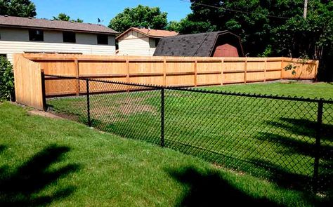 Comparison: Chain link vs. Wooden Fences Half Privacy Fence Half Chain Link, Black Chain Link Fence Ideas, Chain Link And Wood Fence, Homestead Fencing, Black Chainlink Fence, Wood Fence Over Chain Link, Black Chain Link Fence With Wood, Fence Panels Ideas Decor, Chain Link Fence Ideas