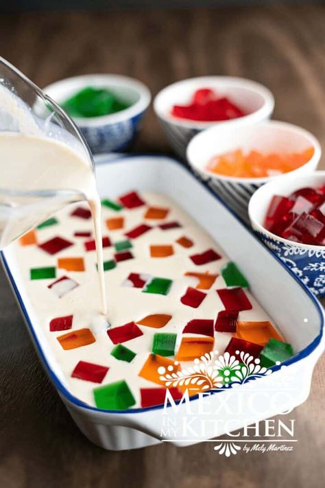 Learn how to make this recipe for your next family gathering or a fiesta. This Mexican jello is a delicious treat that's sure to please everyone's taste buds. Mosaic Jello Mexican, Milk Jello Recipes Mexican, Mexican Jello Desserts, Mosaic Jello, Tequila Shrimp Recipe, Mexican Jello, Mexican Chicken Salads, Jello Recipe, Popular Dessert